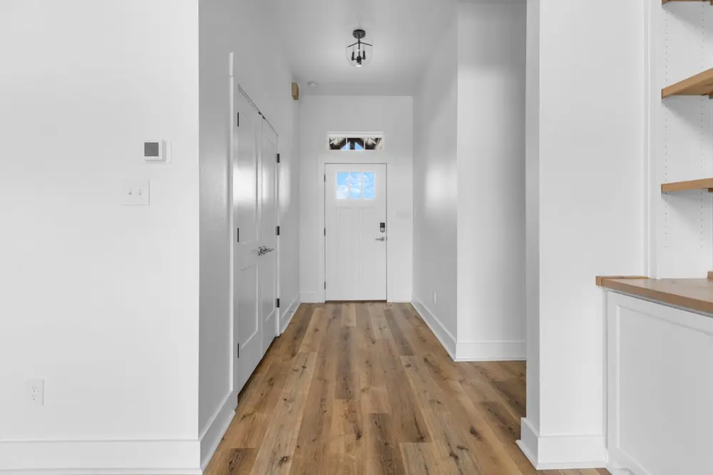 Entry hallway looking to the front door, The Dahl House, a custom home in Sherman, Texas