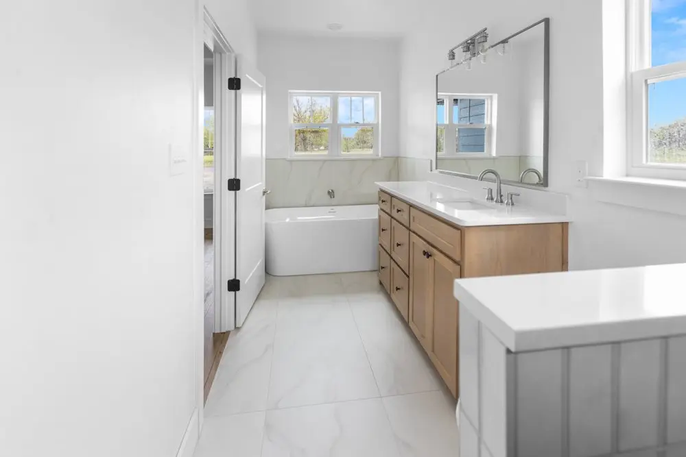 Primary bathroom with a soaking tub, The Dahl House, a custom home in Sherman, Texas