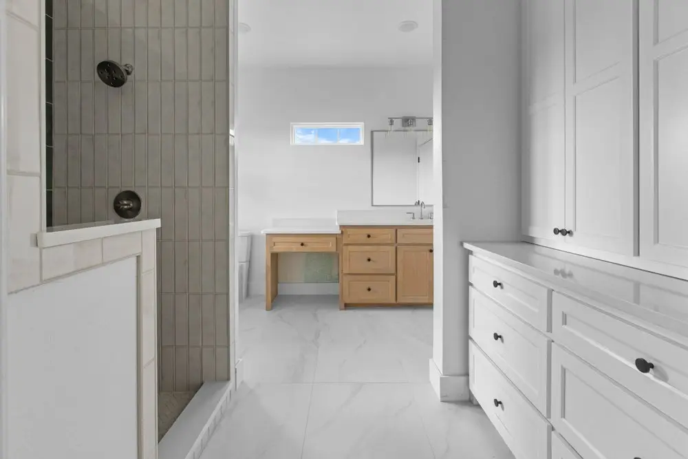 Primary bathroom with a tiled walk-in shower, The Dahl House, a custom home in Sherman, Texas