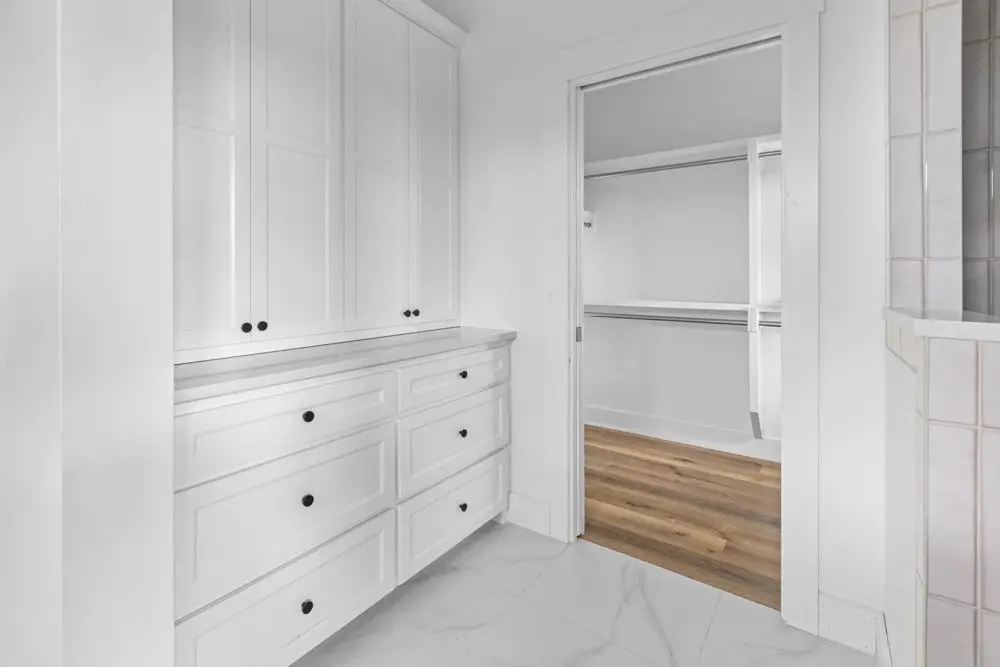Walk-in closet with a built-in dresser, The Dahl House, a custom home in Sherman, Texas