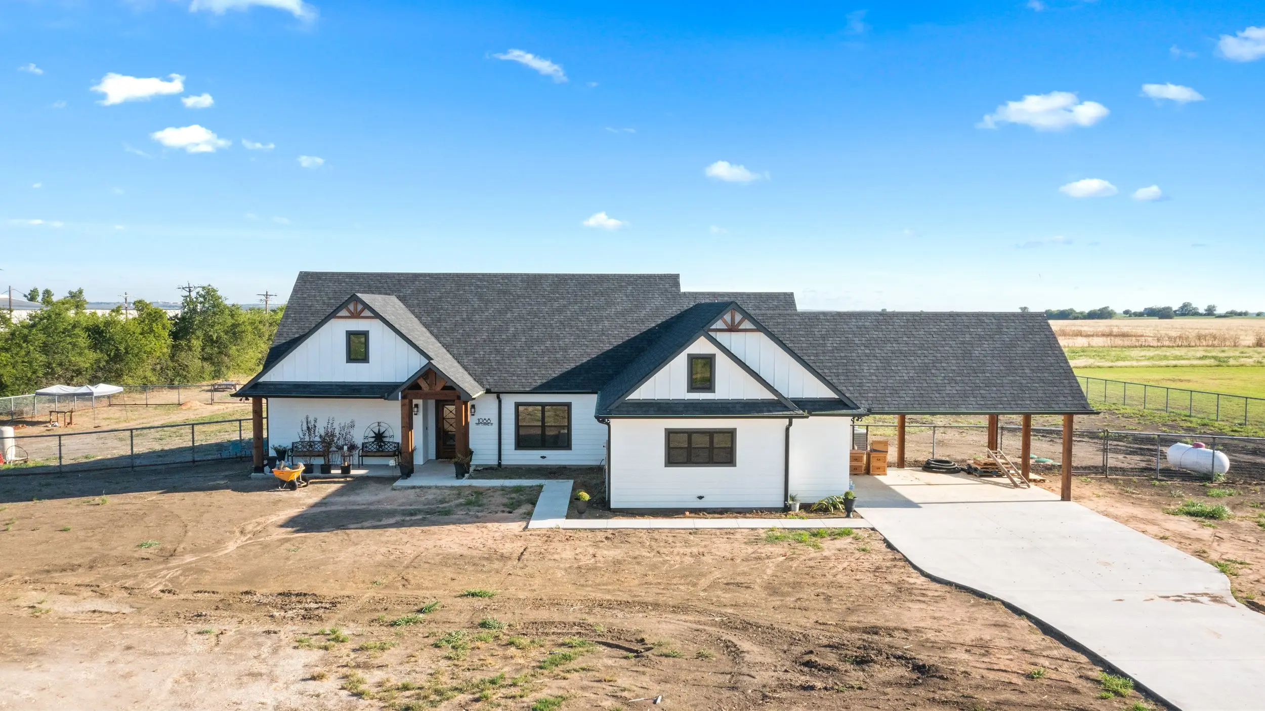 Aerial view of the front elevation, The Lugo House, a custom home in Sherman, Texas