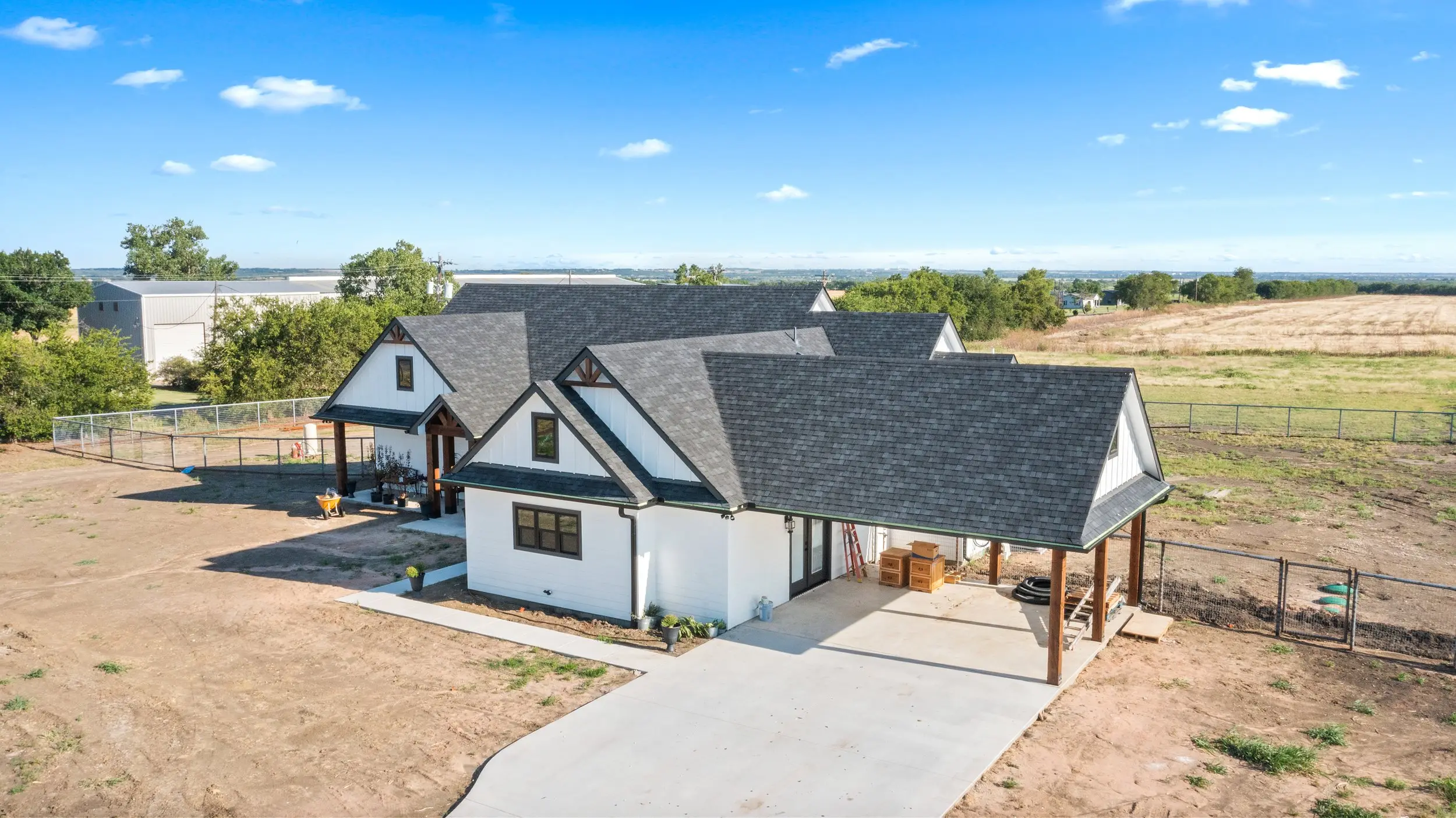 Aerial view of the front of the house and driveway, The Lugo House, a custom home in Sherman, Texas