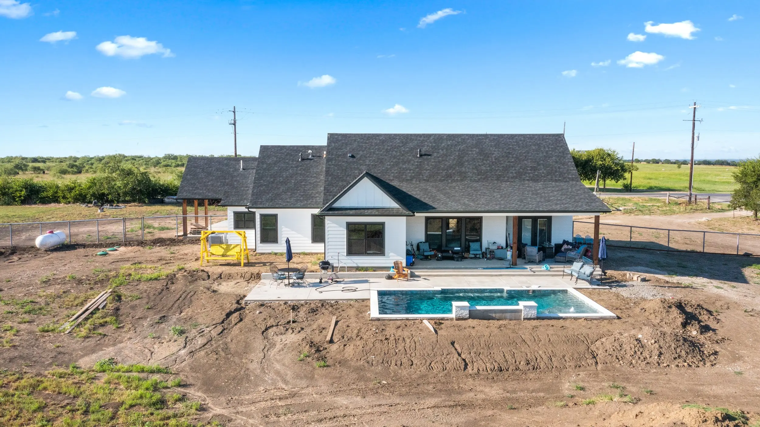 Aerial view of the pool under construction, The Lugo House, a custom home in Sherman, Texas