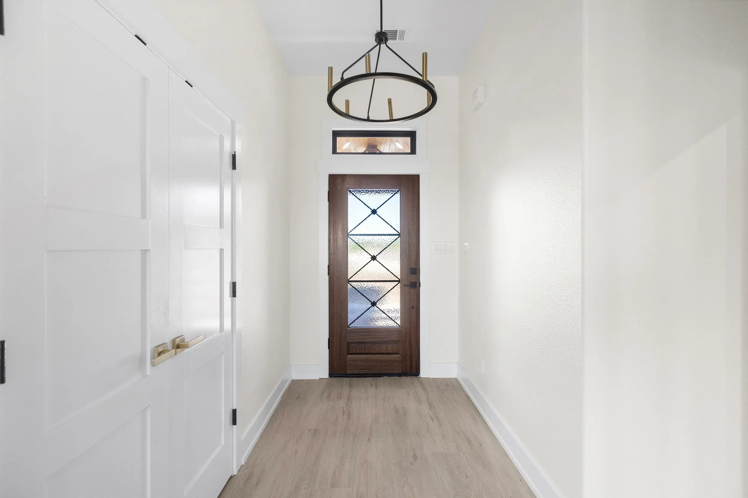Entry foyer looking back at the front door, The Lugo House, a custom home in Sherman, Texas