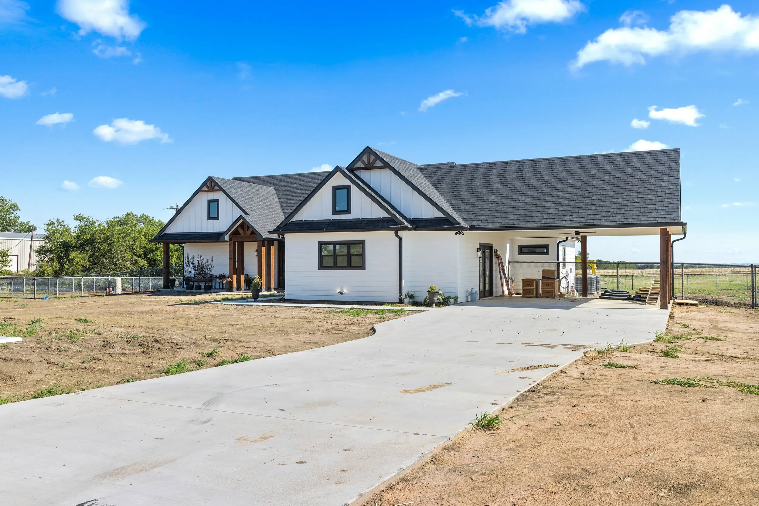 Front of the house with the driveway, The Lugo House, a custom home in Sherman, Texas