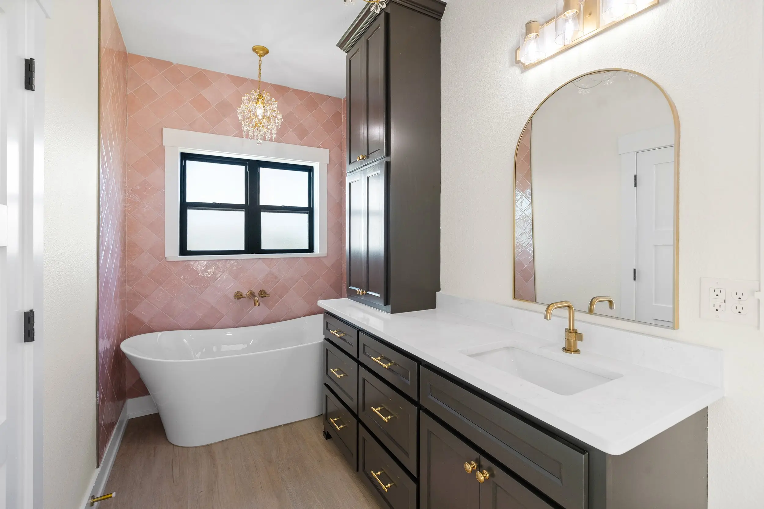 Primary bathroom with a freestanding tub, The Lugo House, a custom home in Sherman, Texas