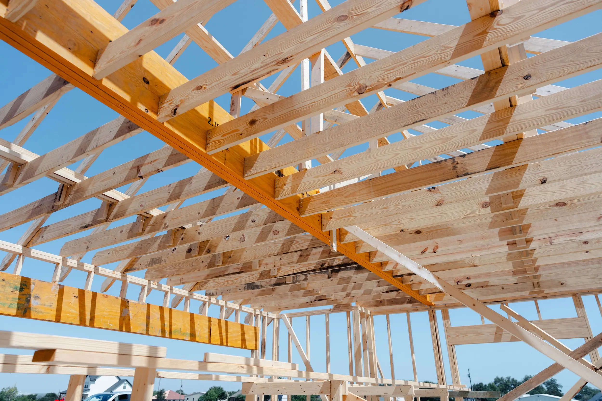Roof framing on a custom home under construction in Sherman, Texas