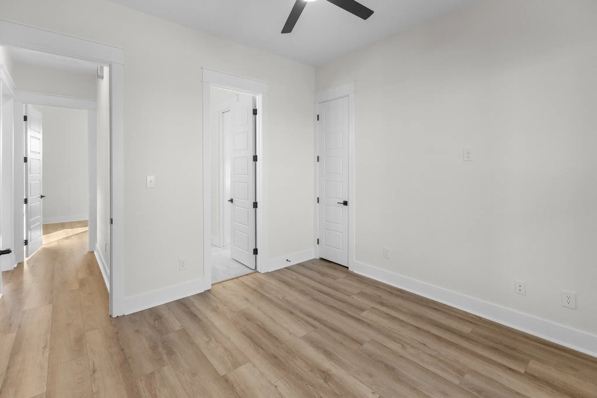 Hallway leading to the bedrooms, The Wester House, a custom home in Sherman, Texas