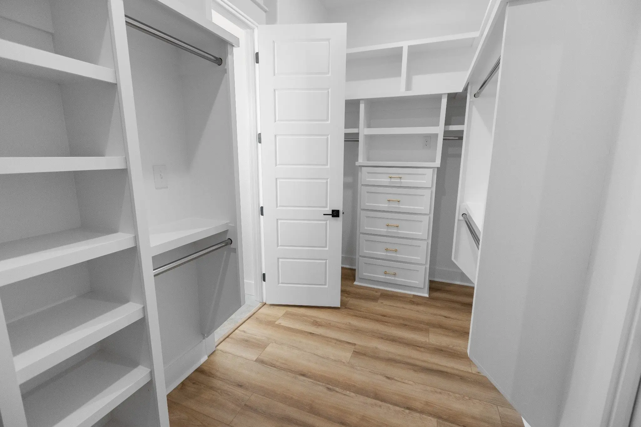Walk-in closet with built-in shelving, The Wester House, a custom home in Sherman, Texas