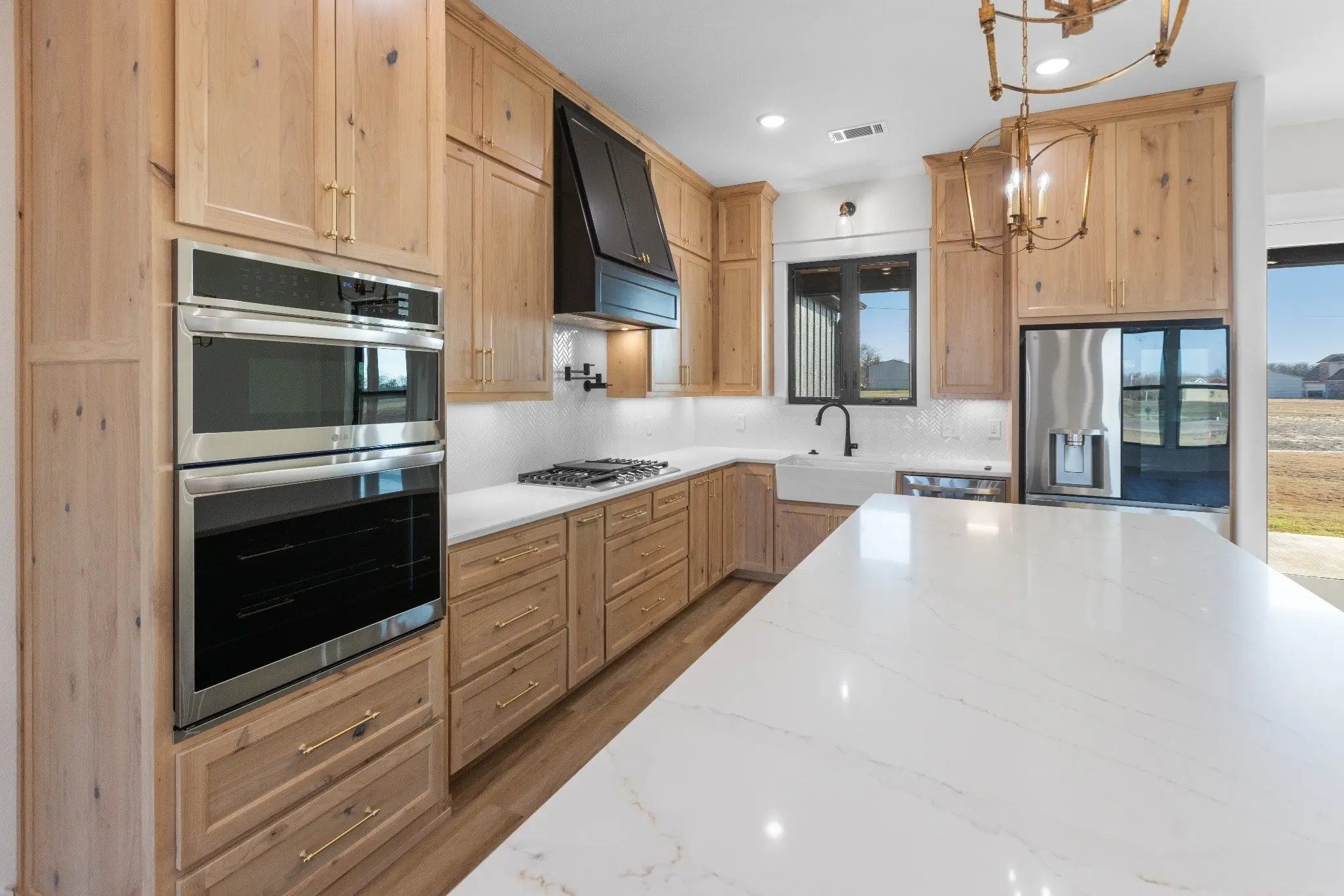 White oak kitchen in a custom modern farmhouse in Sherman, Texas